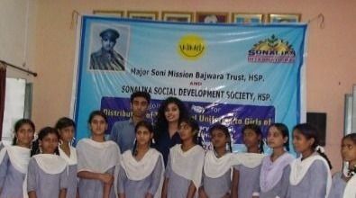 School girls with their uniform sets
